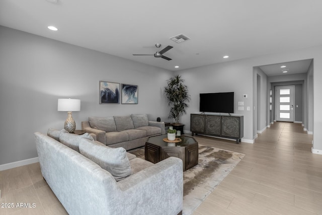 living room featuring ceiling fan