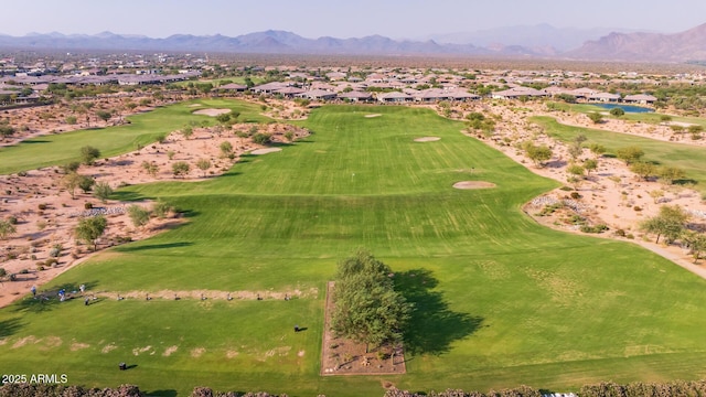 birds eye view of property featuring a mountain view