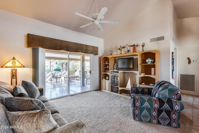 living room featuring carpet, ceiling fan, and high vaulted ceiling