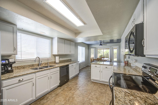 5424 E Florian Ave, Mesa, AZ 85206 - kitchen with dishwasher, stainless steel electric range oven, a sink, a tray ceiling, and a peninsula