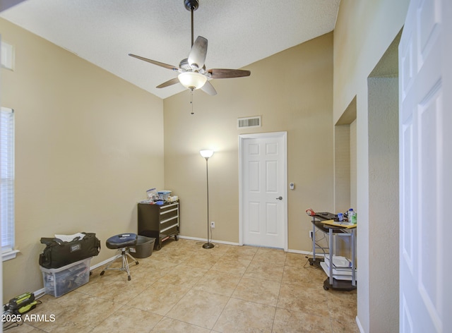 5424 E Florian Ave, Mesa, AZ 85206 - miscellaneous room featuring ceiling fan, high vaulted ceiling, baseboards, and tile patterned flooring