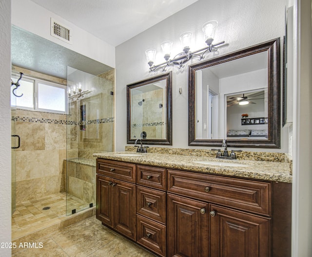 5424 E Florian Ave, Mesa, AZ 85206 - bathroom with a shower stall and double vanity