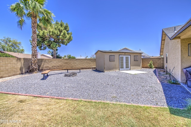 5424 E Florian Ave, Mesa, AZ 85206 - fenced backyard with french doors and an outdoor structure