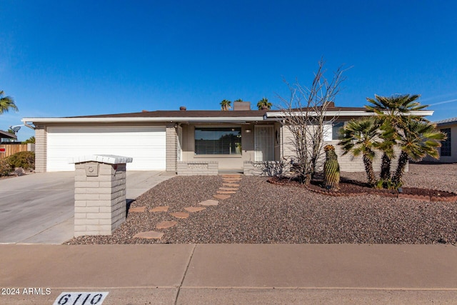 single story home with a garage