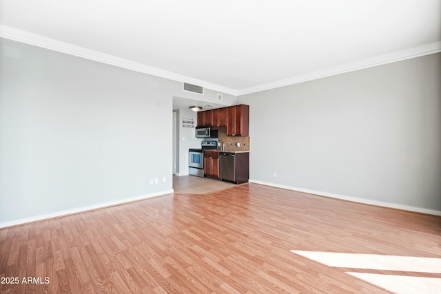unfurnished living room with visible vents, crown molding, light wood-style flooring, and baseboards