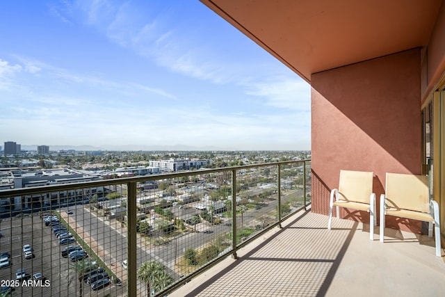 balcony featuring a city view