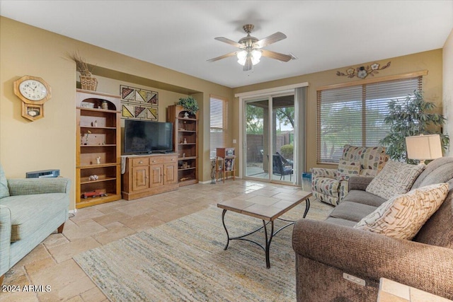 living room with ceiling fan