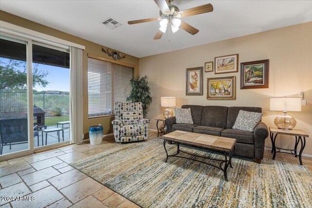 living room with ceiling fan