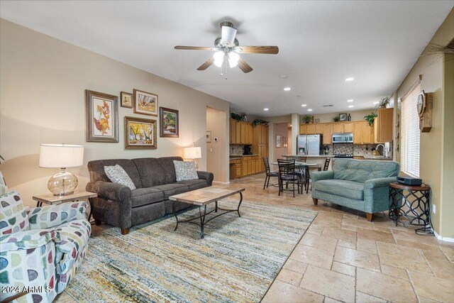 living room with ceiling fan