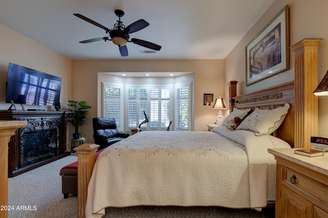 carpeted bedroom featuring ceiling fan