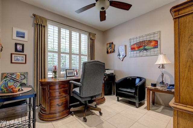 tiled office featuring ceiling fan