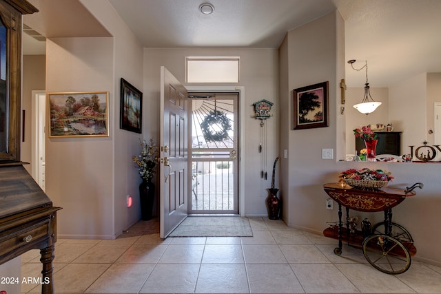 view of tiled foyer entrance