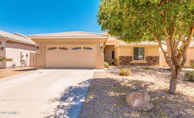 9511 E Kiva Ave, Mesa, AZ 85209 - single story home with stucco siding, a garage, concrete driveway, a tile roof, and stone siding