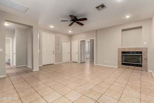 9511 E Kiva Ave, Mesa, AZ 85209 - unfurnished living room featuring ceiling fan, light tile patterned floors, recessed lighting, baseboards, and a tile fireplace
