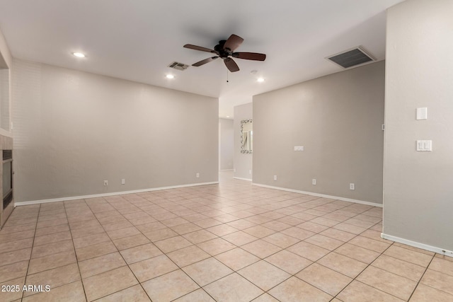 9511 E Kiva Ave, Mesa, AZ 85209 - spare room with a ceiling fan, recessed lighting, light tile patterned floors, and baseboards