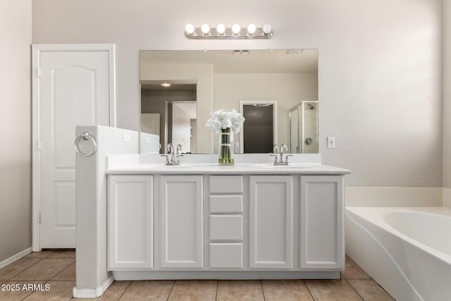 9511 E Kiva Ave, Mesa, AZ 85209 - bathroom with tile patterned flooring, a shower stall, a garden tub, and double vanity