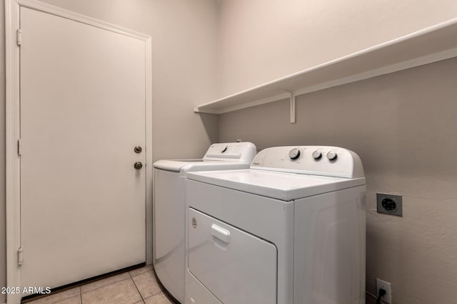 9511 E Kiva Ave, Mesa, AZ 85209 - laundry room featuring washer and clothes dryer and light tile patterned floors
