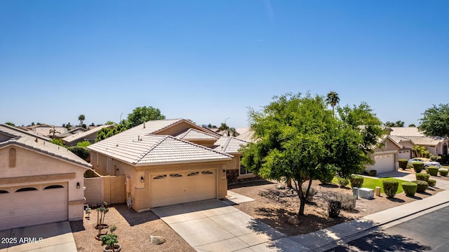 9511 E Kiva Ave, Mesa, AZ 85209 - view of front facade with a tile roof, stucco siding, concrete driveway, a garage, and a residential view