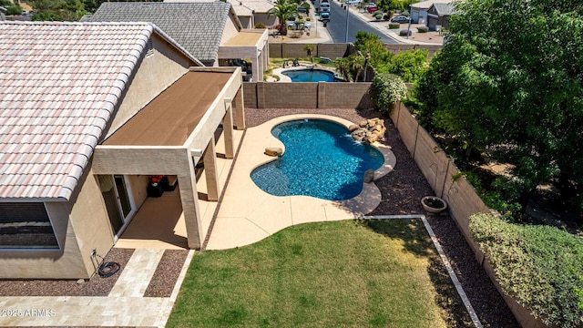 9511 E Kiva Ave, Mesa, AZ 85209 - view of swimming pool featuring a fenced backyard, a patio, and a residential view