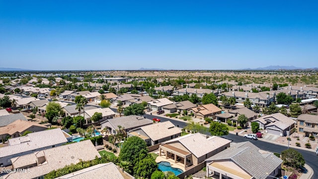9511 E Kiva Ave, Mesa, AZ 85209 - aerial perspective of suburban area featuring a mountainous background