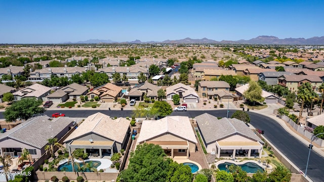 9511 E Kiva Ave, Mesa, AZ 85209 - aerial view of residential area with a pool and a mountainous background