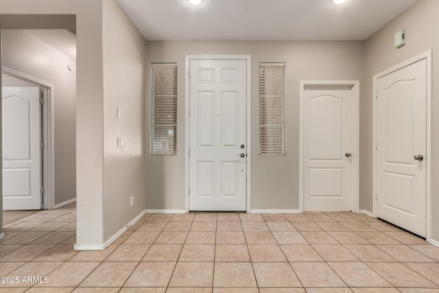 9511 E Kiva Ave, Mesa, AZ 85209 - foyer featuring light tile patterned floors, baseboards, and recessed lighting