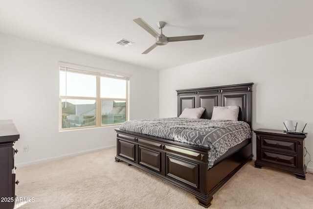 bedroom featuring light carpet and ceiling fan