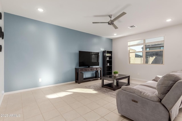 living room featuring ceiling fan and light tile patterned floors