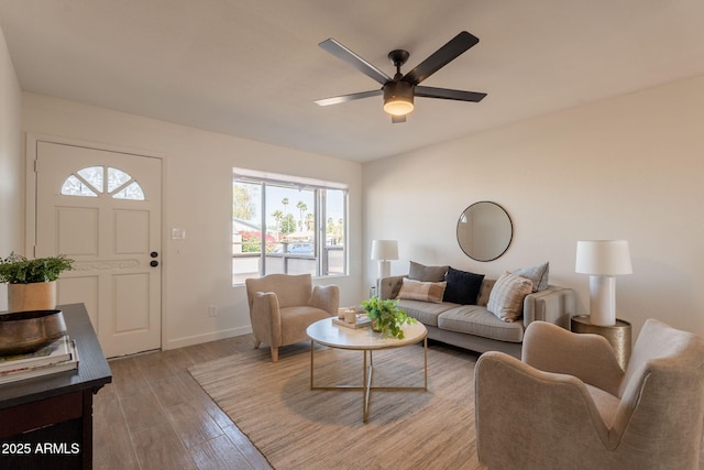 3118 S Los Altos Dr, Mesa, AZ 85202 - living area featuring healthy amount of natural light, ceiling fan, wood finished floors, and baseboards