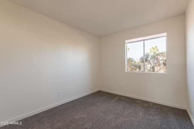 3118 S Los Altos Dr, Mesa, AZ 85202 - unfurnished room featuring dark colored carpet and baseboards