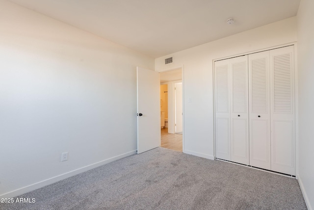 3118 S Los Altos Dr, Mesa, AZ 85202 - unfurnished bedroom with carpet floors, baseboards, and a closet