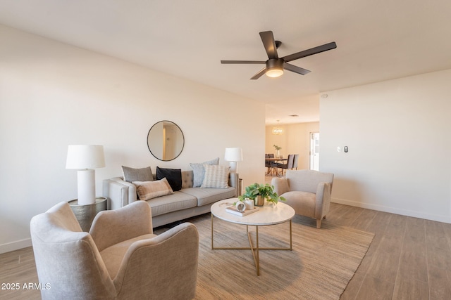 3118 S Los Altos Dr, Mesa, AZ 85202 - living room with light wood-style flooring, ceiling fan, and baseboards