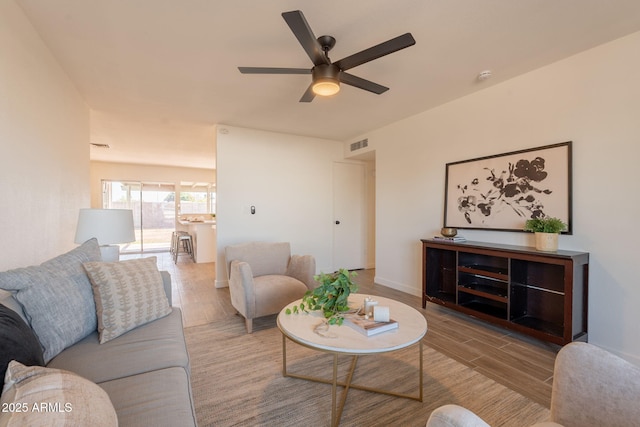3118 S Los Altos Dr, Mesa, AZ 85202 - living room featuring wood finished floors and a ceiling fan