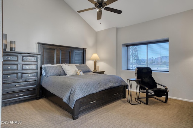 bedroom featuring lofted ceiling, light colored carpet, and ceiling fan