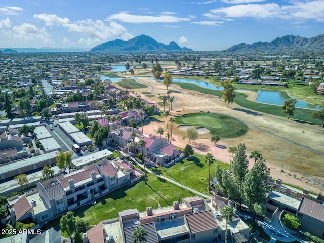 birds eye view of property featuring a water and mountain view