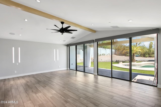 unfurnished room featuring lofted ceiling with beams, light hardwood / wood-style floors, and ceiling fan