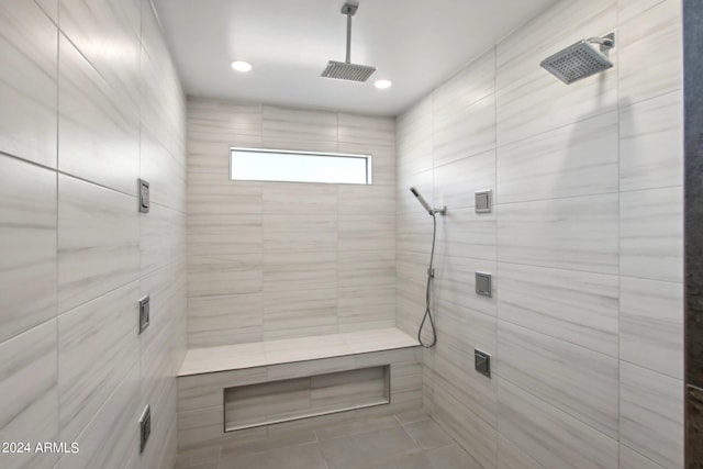 bathroom with tiled shower