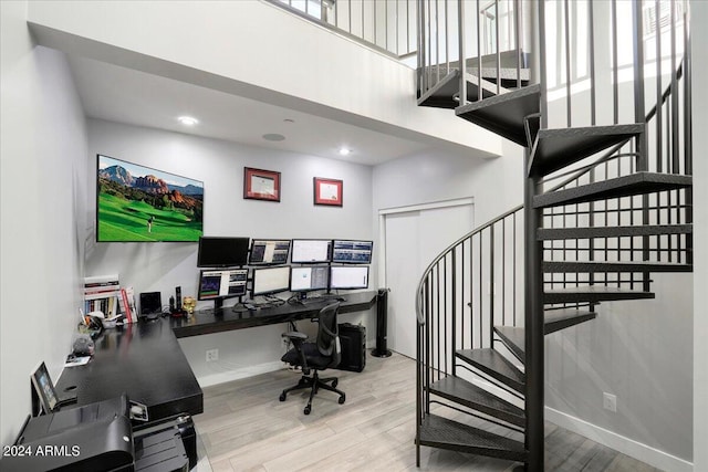 home office with light wood-type flooring