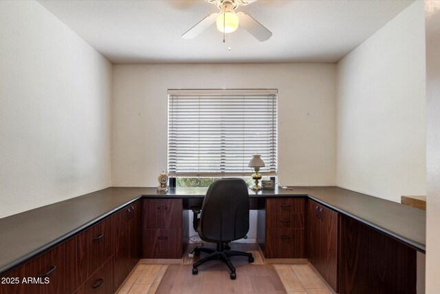 4015 N 78th St Unit 135, Scottsdale, AZ 85251 - office area with ceiling fan, built in desk, and light wood-type flooring
