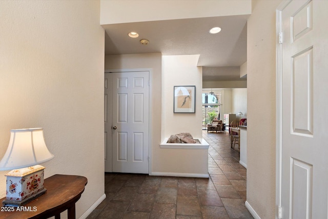 4015 N 78th St Unit 135, Scottsdale, AZ 85251 - corridor with stone finish floors and recessed lighting