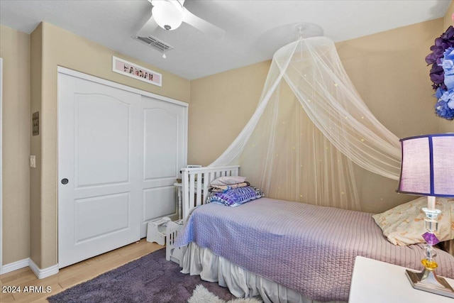 4657 E Matt Dillon Trl, Cave Creek, AZ 85331 - bedroom with wood finished floors, a closet, ceiling fan, and baseboards