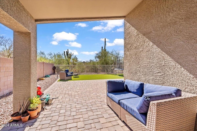 4657 E Matt Dillon Trl, Cave Creek, AZ 85331 - fenced backyard featuring a trampoline, a patio, and outdoor lounge area