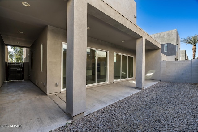 rear view of house with a patio