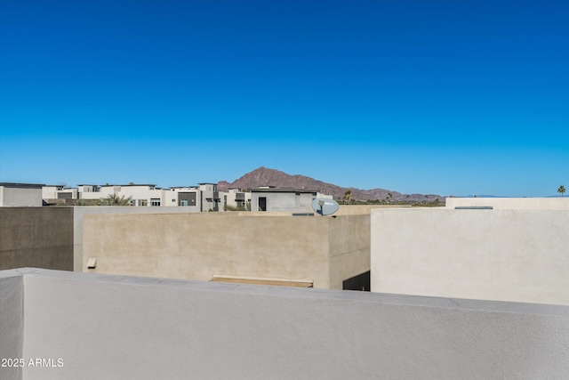 exterior space featuring a mountain view