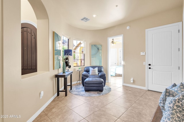 sitting room with light tile patterned flooring