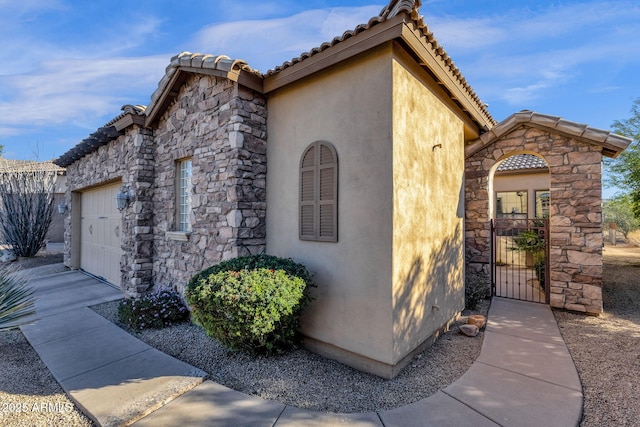 view of home's exterior with a garage