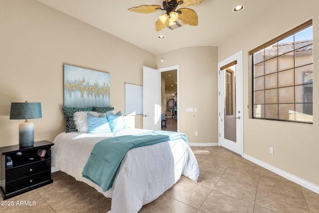 tiled bedroom featuring ceiling fan