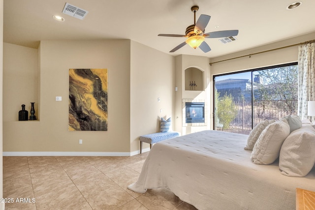 bedroom with light tile patterned flooring, ceiling fan, and access to exterior