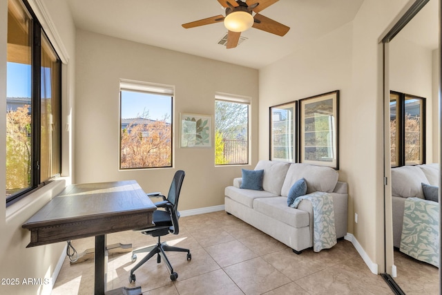 office area featuring ceiling fan and light tile patterned floors