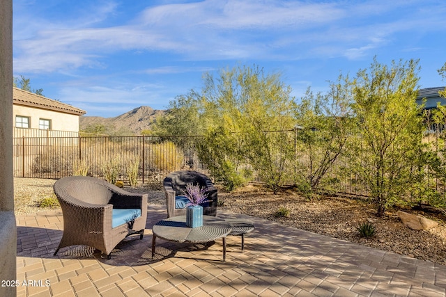 view of patio featuring a mountain view